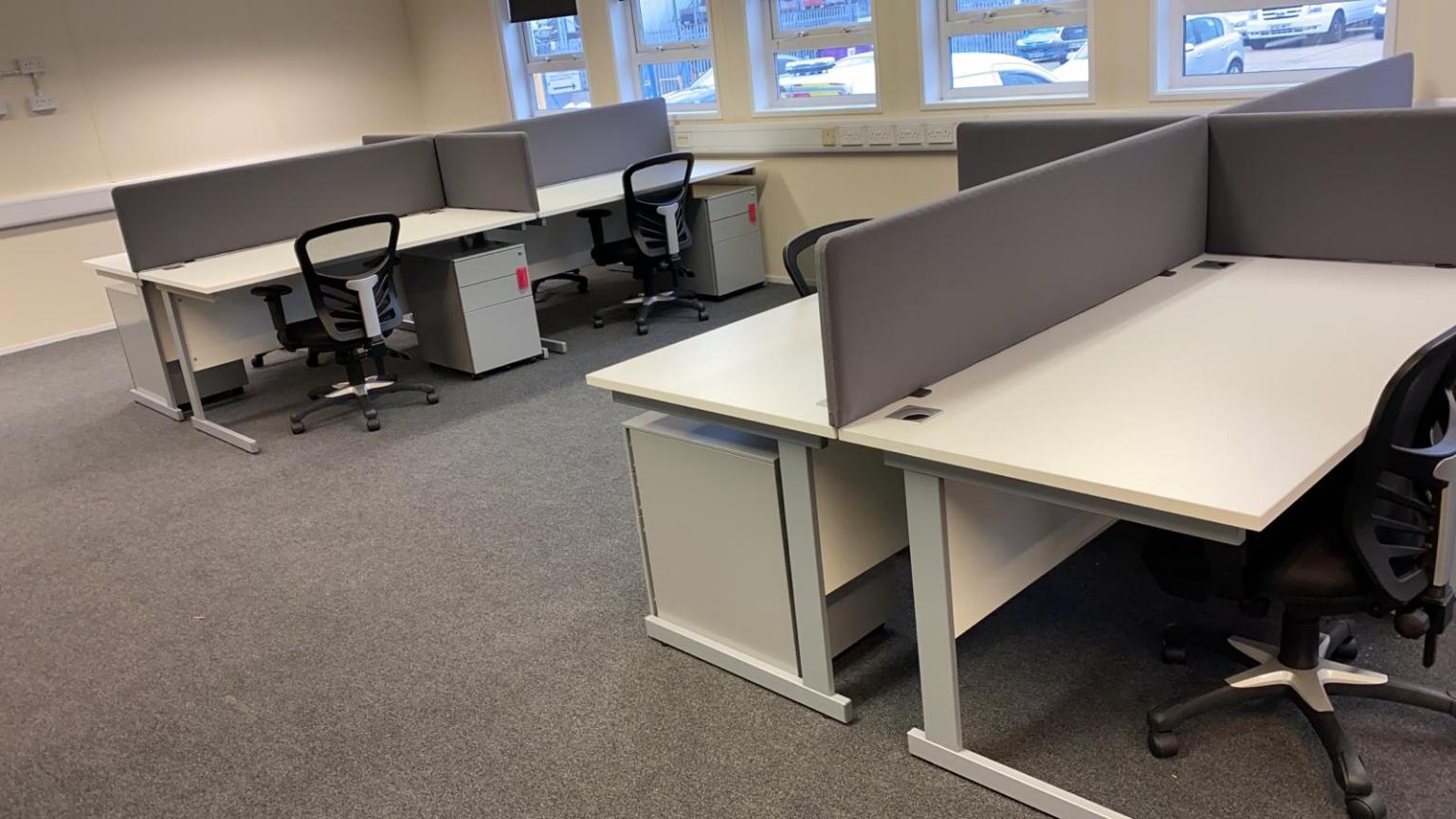 White desking and matching chairs